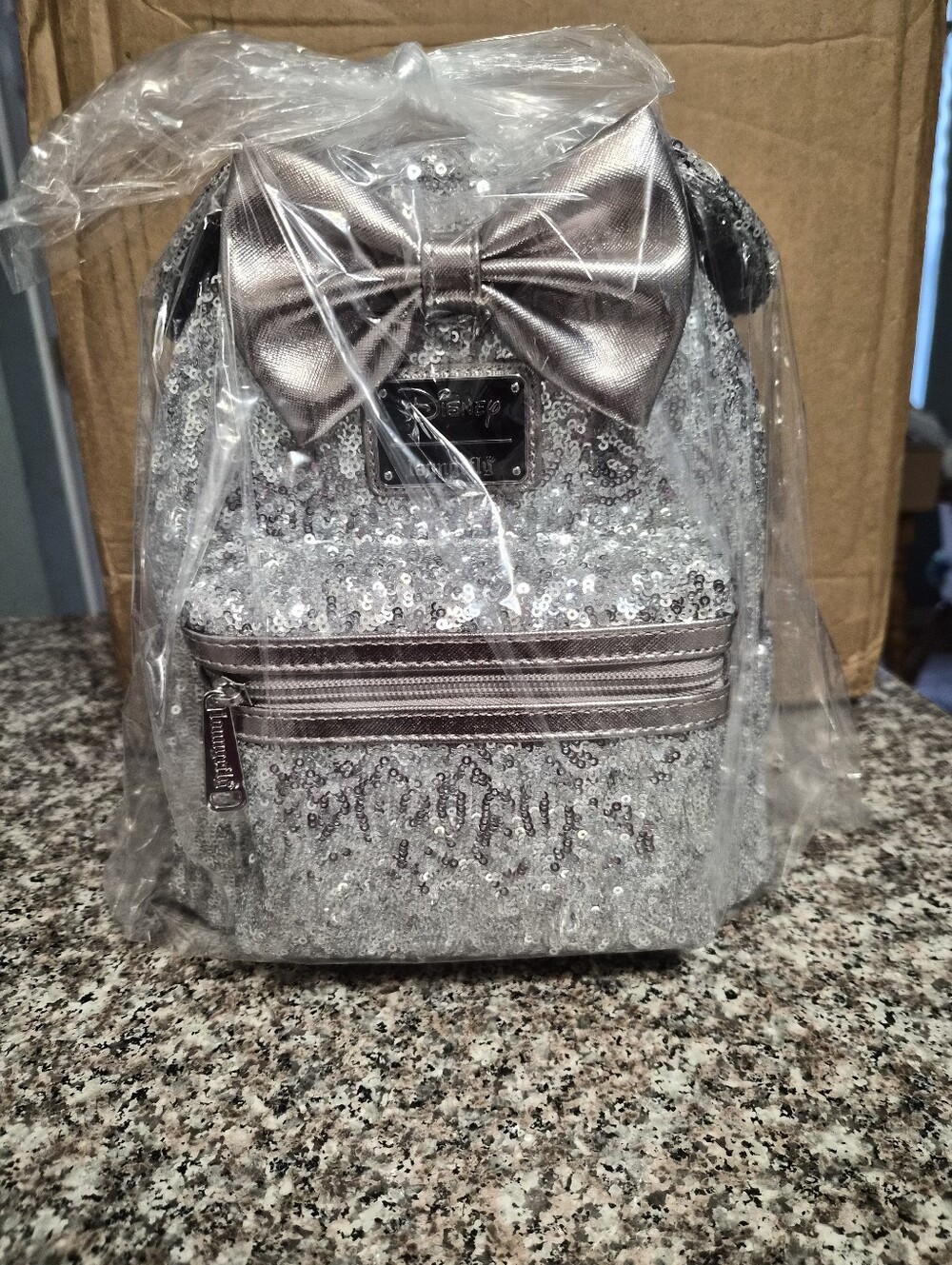 Loungefly Disney Silver Sequin Mini Backpack with Metallic Bow Accent